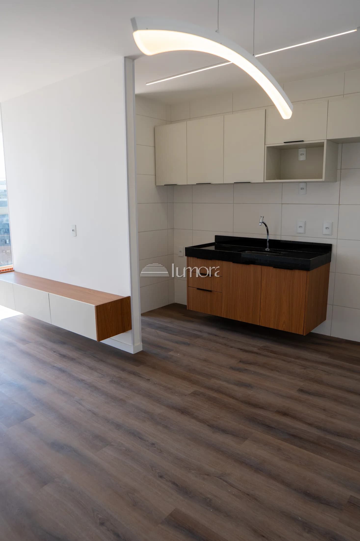 Integração entre sala e cozinha do apartamento Torre Evidence